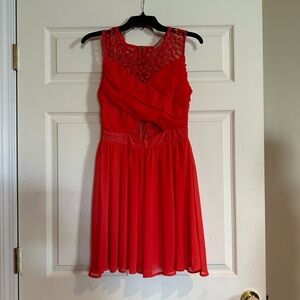 Red dress with cut out, size 3